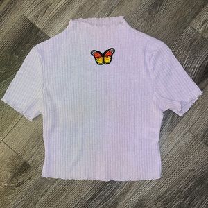 Sweater crop top with embedded butterfly